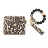 Branelli di silicio Portachiavi Bracciale Portachiavi Bracciale Portachiavi con ghepardo Leopardo Pelle Leopard Tassel ID Carta d'identità Borsa da portafoglio Uomo Donna Handmade Bragle Keyrings Accessori