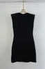 Spring and Summer Black O-Neck Collar Seyless Hollow Out Circle Breve Dress da donna Stile sexy GX1012 210421