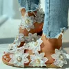 Тапочки Женщины Slippers Женская туфли на ноги кольцо цветок плоские сандалии 2021 повседневные шлепанцы плюс мода