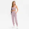 Lösa sportbyxor Kvinnors körande Yoga Joggers Pocket Fritid Snabbtorkande Fitness Leggings Workout Gym Kläder