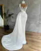 Fantastisk arabisk aso ebi sjöjungfru aftonklänningar lyxiga pärlor med hög hals illusion topp prom party klänningar spetsar applikationer peplum ruched vestidos de de