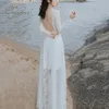 Zomer vrouwen witte kant doorkijk door lange mouw holle backless maxi vakantie strand jurk 210415