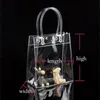 Present wrap 10pcs20pcslot transparent mjuk pvc -tote förpackningspåsar med handslingan klar plasthandväska kosmetisk väska8860840