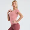 Yoga Outfit Быстрые сухие узкие рубашки женщины красота задний с коротким рукавом приготовления тренажерный зал Tops Fitness работает тренировки спортивные футболки спортивные одежды