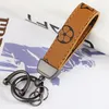 بو الجلود المفاتيح مصمم مفتاح سلسلة مشبك عشاق سيارة اليدوية سلاسل الرجال النساء حقيبة قلادة الملحقات