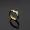 Toppkvalitet Extravagant Love Ring Four Prong Solitaire Diamond Guld Silver Rose Färger Rostfritt Stål Par Ringar Mode Kvinnor Designer Smycken Party Gåvor