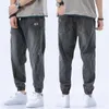Yeni Moda Çizik Delik Kot Erkekler Bahar Sonbahar Rahat Harem Pantolon Erkek Yıkanmış Denim Pantolon Elastik Bel 3XL 4XL Y0927