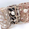 Bolsos de mano para mujer, diseñador de lujo, perla de cristal, ahuecado, bolso de mano tipo jaula, bolso cruzado con cadena de marca famosa para boda ZD2119