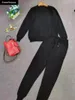女性2ピースパンツ冬暖かいニットスーツ女性2021ファッションプレッピースタイル古い学校Vネックプルオーバーセーター+セットブラック5色