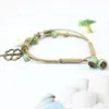 Charme Armbänder Keramik Blume und Legierung Blatt Multi-Layer Seil Frauen Handmade kleine Gänseblümcheneisenturm Anhänger Armband Geschenk