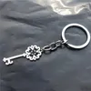 Ihålig nyckel nyckelring rostfritt stål nyckelringar trendiga män kvinnor smycken 12 stycken hel