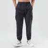 Pantaloni sportivi per il tempo libero Completi da yoga da uomo Leggings ad asciugatura rapida all'aperto Legatura del piede in tessuto sciolto Tute da fitness Abbigliamento da palestra per alpinismo Allenamento