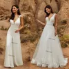 Lace Chiffon Beach Jumpsuit Bröllopsklänningar med avtagbart tåg 2021 Sexig V-Neck Outdoor Country Bohemian Bride Pant Suit