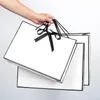 Förvaringspåsar Födelsedag Presentpapper för kläder Facial Mask Cosmetic Wrapping Candy Shopping Bag Business Cardboard Packaging Box