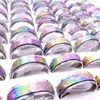 Wholesae 100pcs / lot 스테인레스 스틸 스핀 밴드 링 회전 가능한 여러 가지 빛깔의 레이저 인쇄 된 믹스 패턴 패션 쥬얼리 회 전자 파티 선물