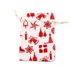Burlap Väskor Jute Drawstrings Candy Pouch Gift Wrap Metallic Print Jul Treat Bag Olika Designs Holiday Party Decoration Färgglada 2 storlekar