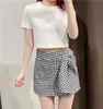 Jupe femme noir blanc Plaid taille haute jupe courte femme mode vichy avant noeud décontracté été Shorts 210519