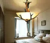 ヨーロッパ国のレトロな樹脂鹿ホーン光沢のあるリビングルームLampadari家の装飾LEDライト
