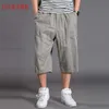 Duże rozmiary Mężczyźni Casual Shorts Sport Summer Streetwear Cargo Spodenki Cienkie Luźne Długa praca z kieszeniami Roupas Mens Odzież XX60MS 210720