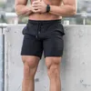 Męskie siłownie siłowni spodenki kulturystyka jogger trening szybkoschie spodnie suchym męskie letnie slimfit luźne spodnie plażowe 210714
