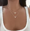 Ny Böhmen Enkel Fashion Imitation Pearl Love Heart Dubbelskikt Clavicle Chain Halsband Tillbehör Kvinnlig smycken Partihandel