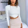 Kvinnor Mode Solid Stickad Tshirt O Neck Bodycon Chic Crop Tops Långärmad Oregelbunden Hem Kort T-shirt Mujer Camisetas 210413