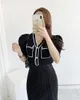 Летний цвет, заблокированные вязаные кардиган женщины винтажные корейские с коротким рукавом V-образным вырезом.