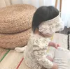 Baby Girls Симпатичные Цветочные Кружева Лоскутное Длинные Рукавы Комбинезоны с Гринкой Симпатичные Осень Маленькая Принцесса Комбинезон 210708