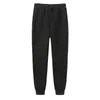 Marque pantalons hommes femme hiver pantalons décontractés mode Joggers automne noir blanc pantalons de survêtement polaire fille rouge rose Stretch