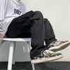 Styles noirs / blanc décontracté mode lâche droite jambe masculine streetwear hip-hop poche pantalon de cargaison masculine