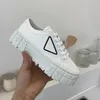 Dubbelhjul Nylon Gabardine Sneaker Chunky Lättviktssula Skor För Kvinnor Vit Blå Desert Beige Plattform Canvas Sneakers Inspirerade av Motocross Däck Definierar