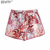 Zevity女性のファッション花のプリントパッチワーク夏のスカートショートパンツの女性のシックな弾性ウエストリボンPantalone Cortos P1100 210719