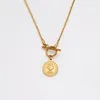 gold coin toggle necklace