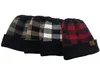 New style ladies plaid ponytail woolen CC cap, fashionable European and American curled edge warm knitting warm earmuff head hat