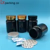 30 PCS 80 100 ml Botella de píldora de plástico negro Organizador Polvo Dulce Sal de baño Pasta de sellado Envase cosmético vacío Gran cantidad