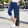 Pantalon longueur mollet pour Homme, short décontracté avec poches, bouton uni, 6 couleurs, grande taille, été, 2022