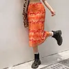 outfit della gonna arancione