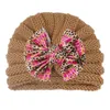 Hår tillbehör söta babykläder spädbarn flicka pojke vinter stickning beannie blomma bowknot varm mössa virkning stickad hatt turban
