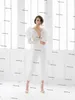 White Beach Wedding Jumpsuit Dresses 2021 V Neck Backless Ruffles Long Sleeve Wedding Gowns with pant suit Robe De Soiree