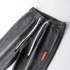 Jeans cargo da uomo larghi Moda Harlan Cotton Streetwear Pantaloni Harajuku Pantaloni da jogging Pantaloni a vita elastica Uomo M-3 4XL 210716