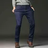 Hommes mode hiver jean hommes noir Slim Fit Stretch épais velours pantalon chaud jean décontracté polaire pantalon mâle grande taille 211120