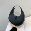 Sacs Design de niche pour femmes, nouvelle mode d'été, sac demi-lune à une épaule sous les bras