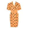 orange dress white polka dots
