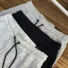 Ruimte katoen mannen ontwerper zomer broek klassieke sport joggingbroek gelamineerd rits ontwerp top materiaal fitness joggers broek