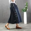 Kjolar nini underland kvinnor vår bomull denim kjol 2022 sommarhål broderi fjäril vintage elastisk midja a-line