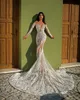 Arabski Aso Ebi 2021 Luksusowe koronkowe suknie ślubne z koralikami Sheer Szyja Długie rękawy Vintage Seksowne sukienki dla nowożeńców ZJ366