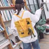 캔버스 여성 핸드백 어깨 가방 대용량 간단한 접이식 핸드백 쇼핑 개구리 펜던트 소녀와 쇼핑
