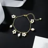 Catena a maglie Bracciale gioielli alla moda Stile dolce Uno strato Placcatura dorata Fiore bianco Perla naturale Per regalo festa da donna Trum22