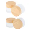 2021 Frostat glasburk Hudvård Eye Cream Jars Pot Raffillerbar flaska Kosmetisk behållare med träkorns lock 5g 10 g 15 g 30 g 50g