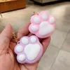 Porte-clés chat patte de chat clé de voiture personnalité en silicone créatif couple pendentif joli sac